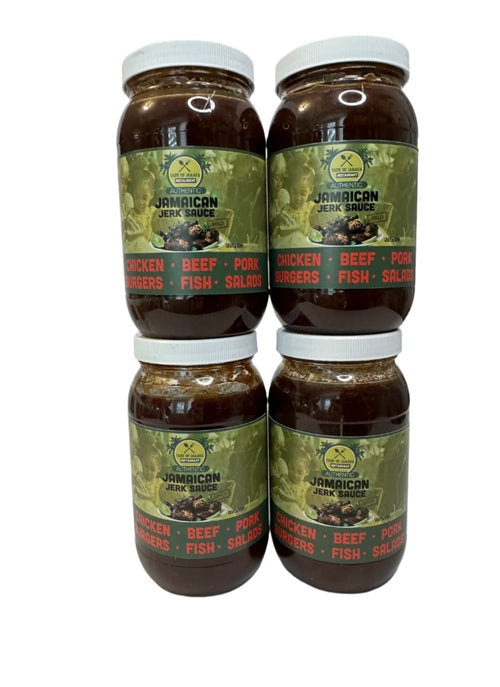 Four jars of Jamaican jerk sauce on a white background